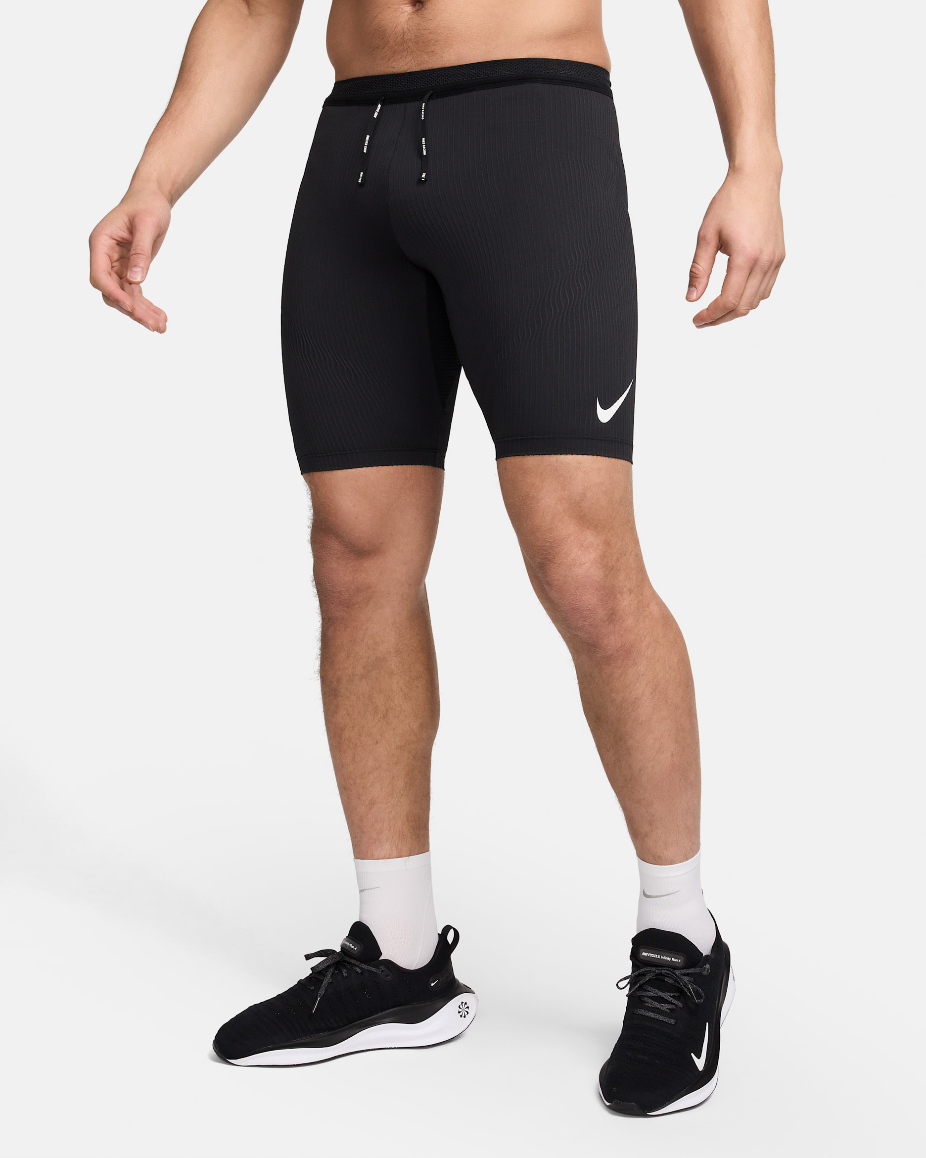 Nike AeroSwift Men's Dri-FIT ADV Running 1/2-Length Tights. Nike.com